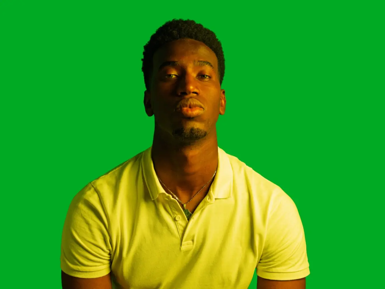 A green-screen backdrop