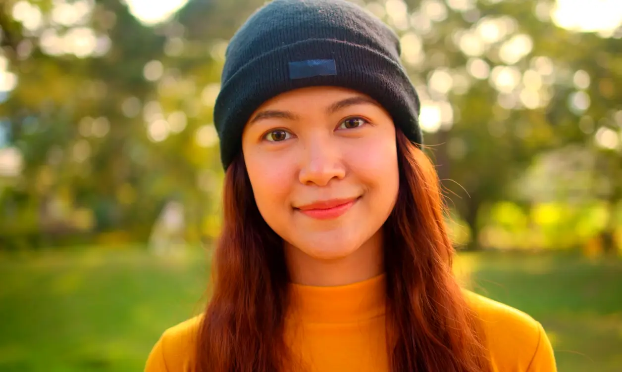 Creator filmed at eye level with vibrant, high saturation color grading